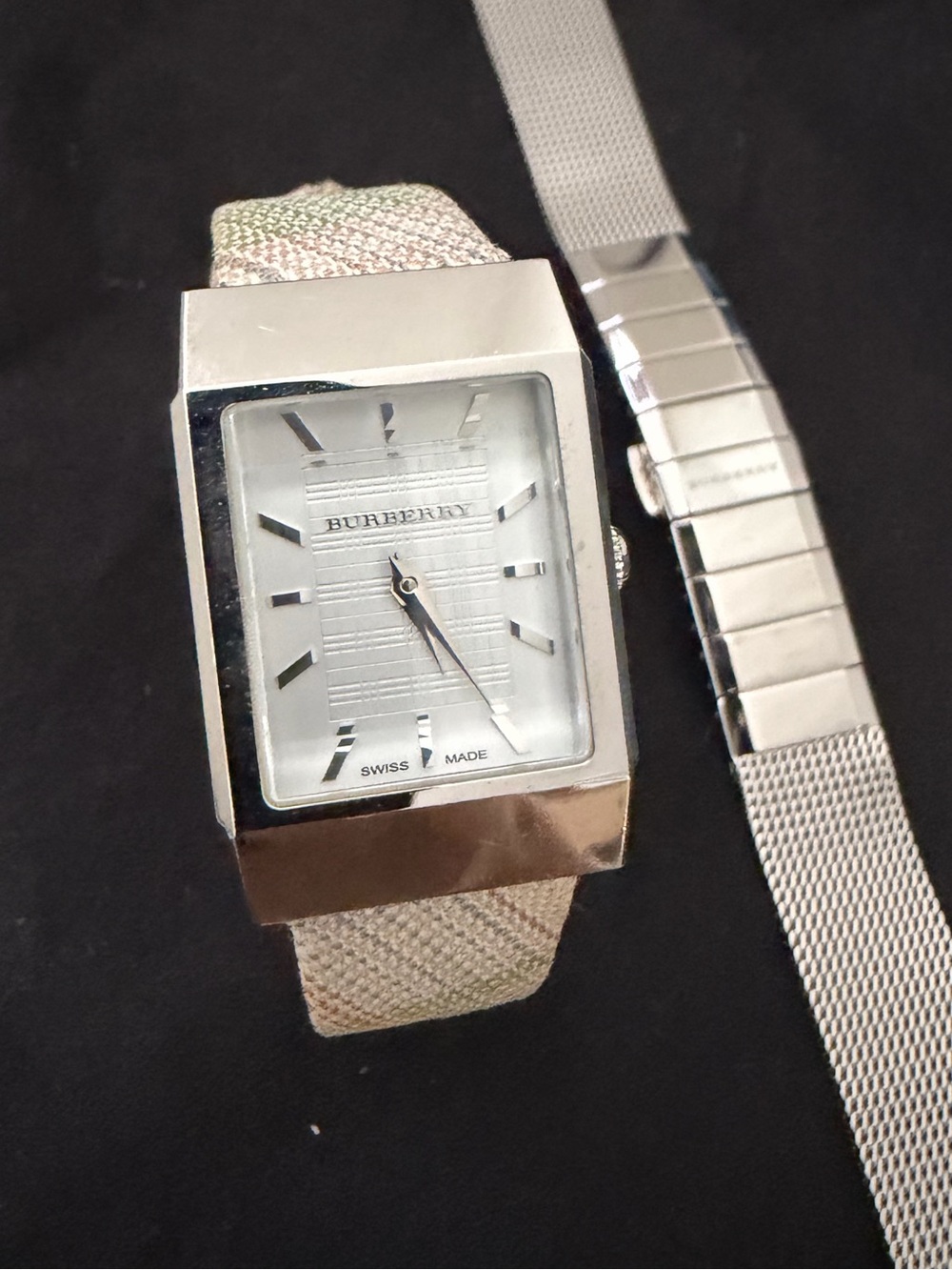 Authentic vintage Burberry watch with extra strap.